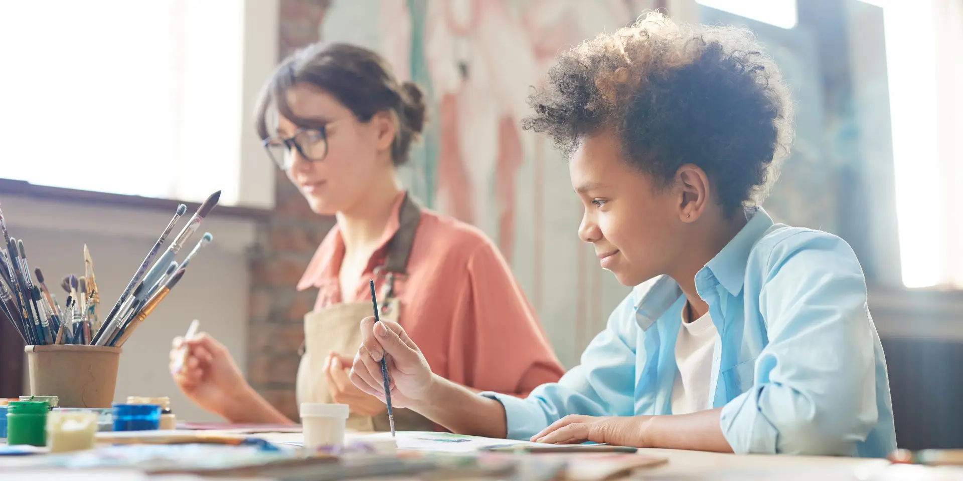 People painting at the table