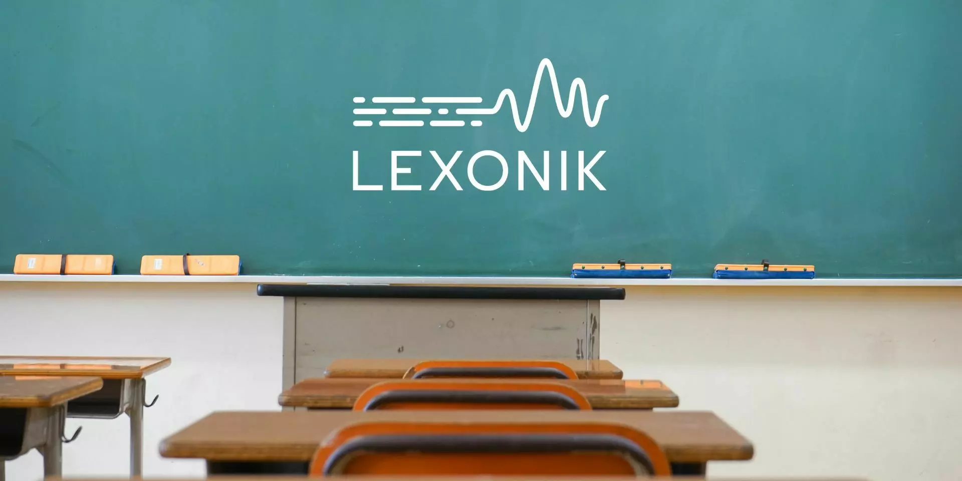 a blackboard in a classroom with the lexonik logo written on it