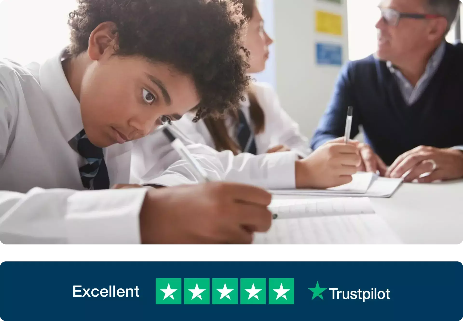 primary school student working at a desk on a literacy programme and a five-star trustpilot review